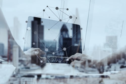 Laptop with grafic network on it