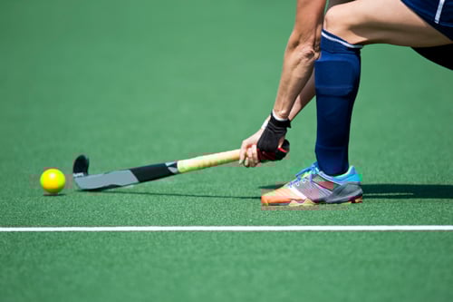 Hockeyer op hockeyveld