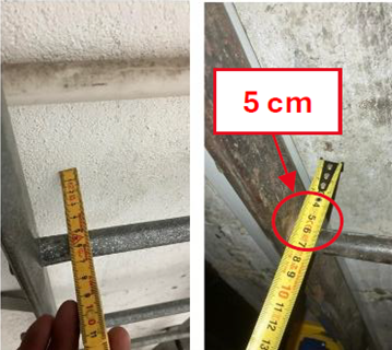 S&auml;kert arbete - icke godk&auml;nt: stegpinnarna ger otillr&auml;ckligt fotutrymme, m&aring;ttband visar endast 5 cm. 